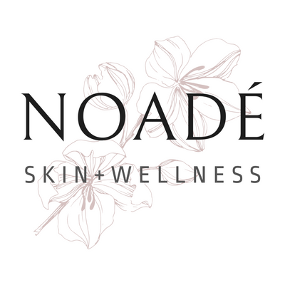Noadé Skin and Wellness logo with floral design