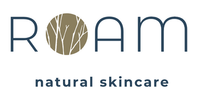 Roam natural skincare logo with tree design.